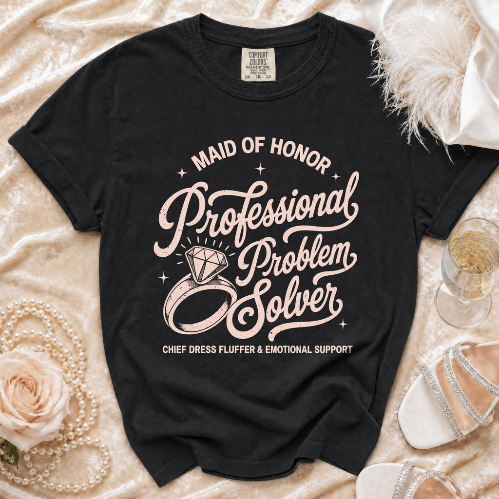Black t-shirt with "Maid of Honor Professional Problem Solver" text and diamond ring.