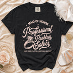 Black t-shirt with "Maid of Honor Professional Problem Solver" text and diamond ring.