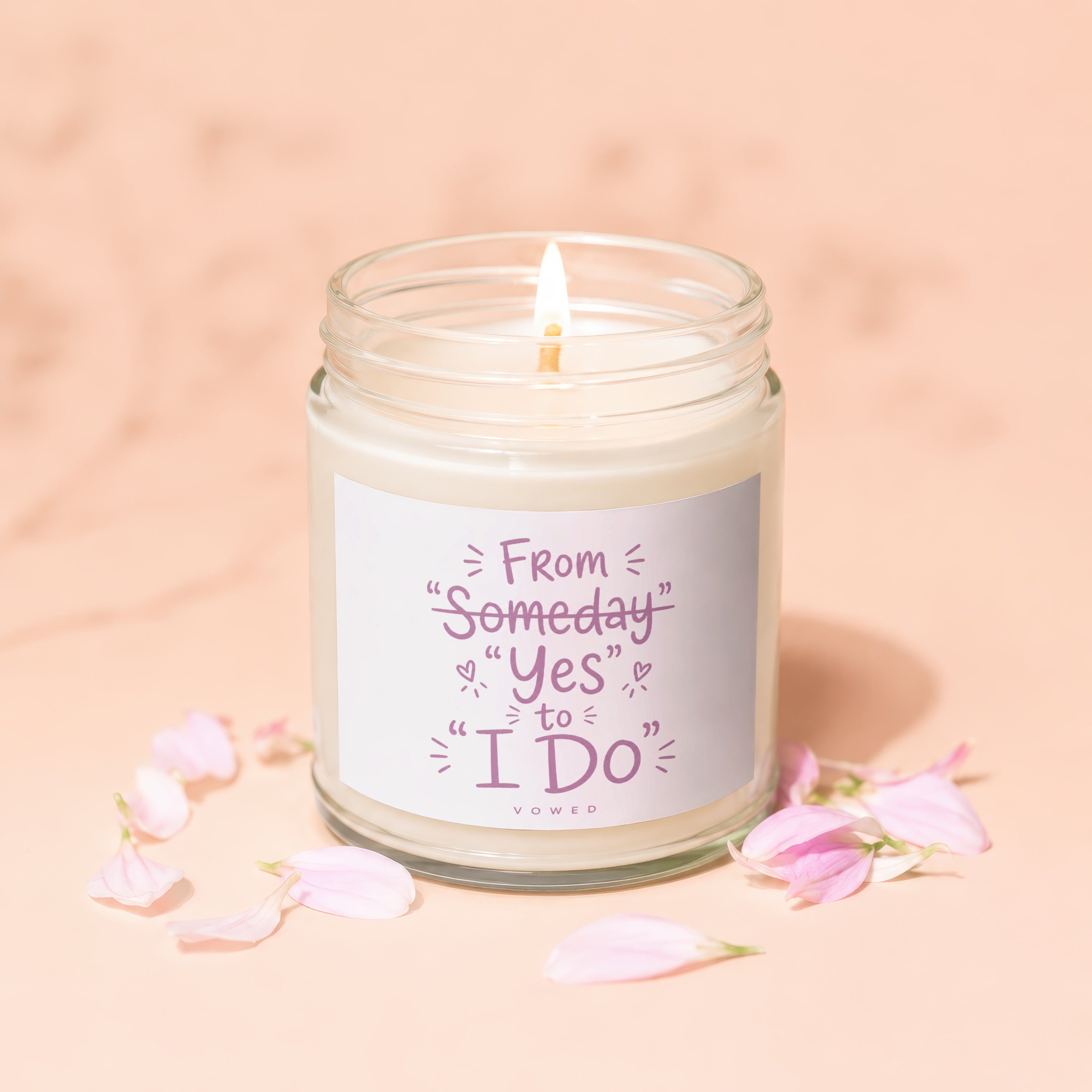 Scented candle with romantic text: "From Someday to Yes to I Do."