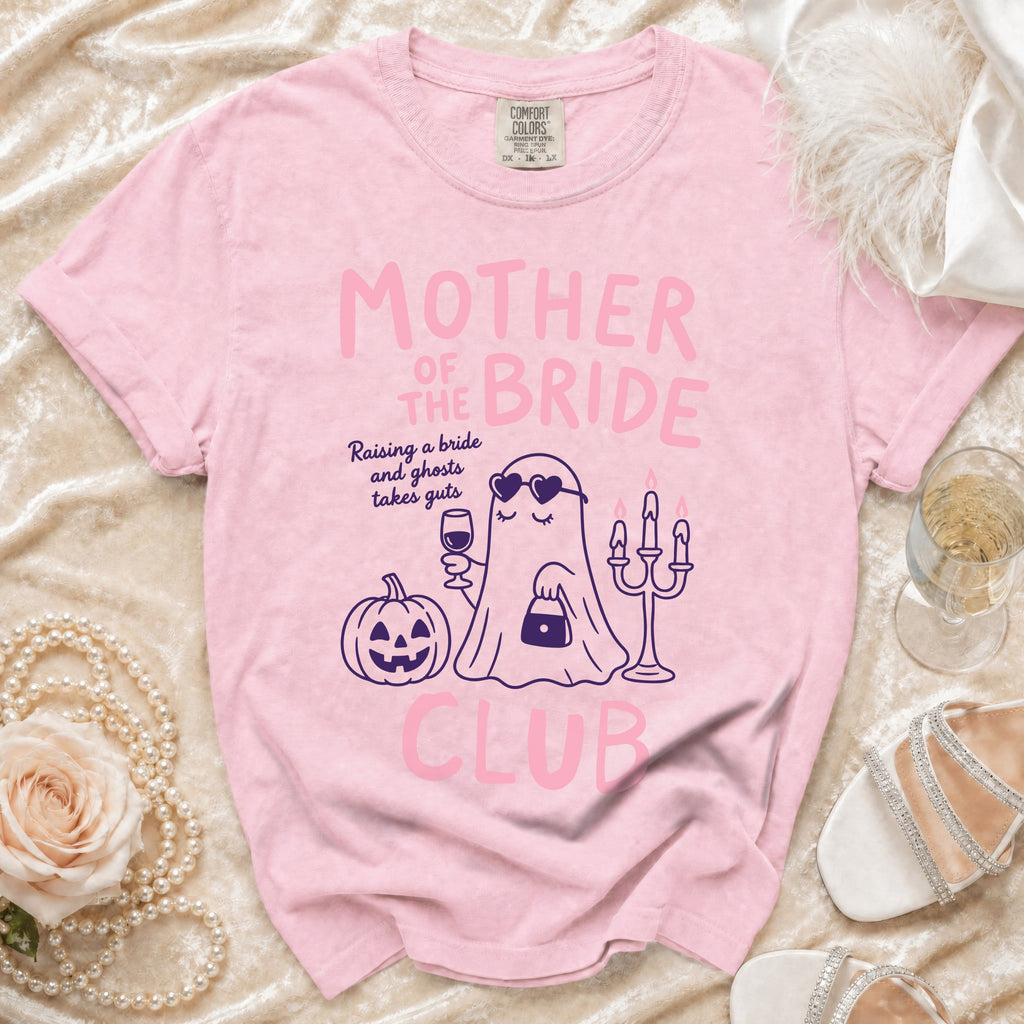 Pink t-shirt with "Mother of the Bride Club" text and ghost graphic.