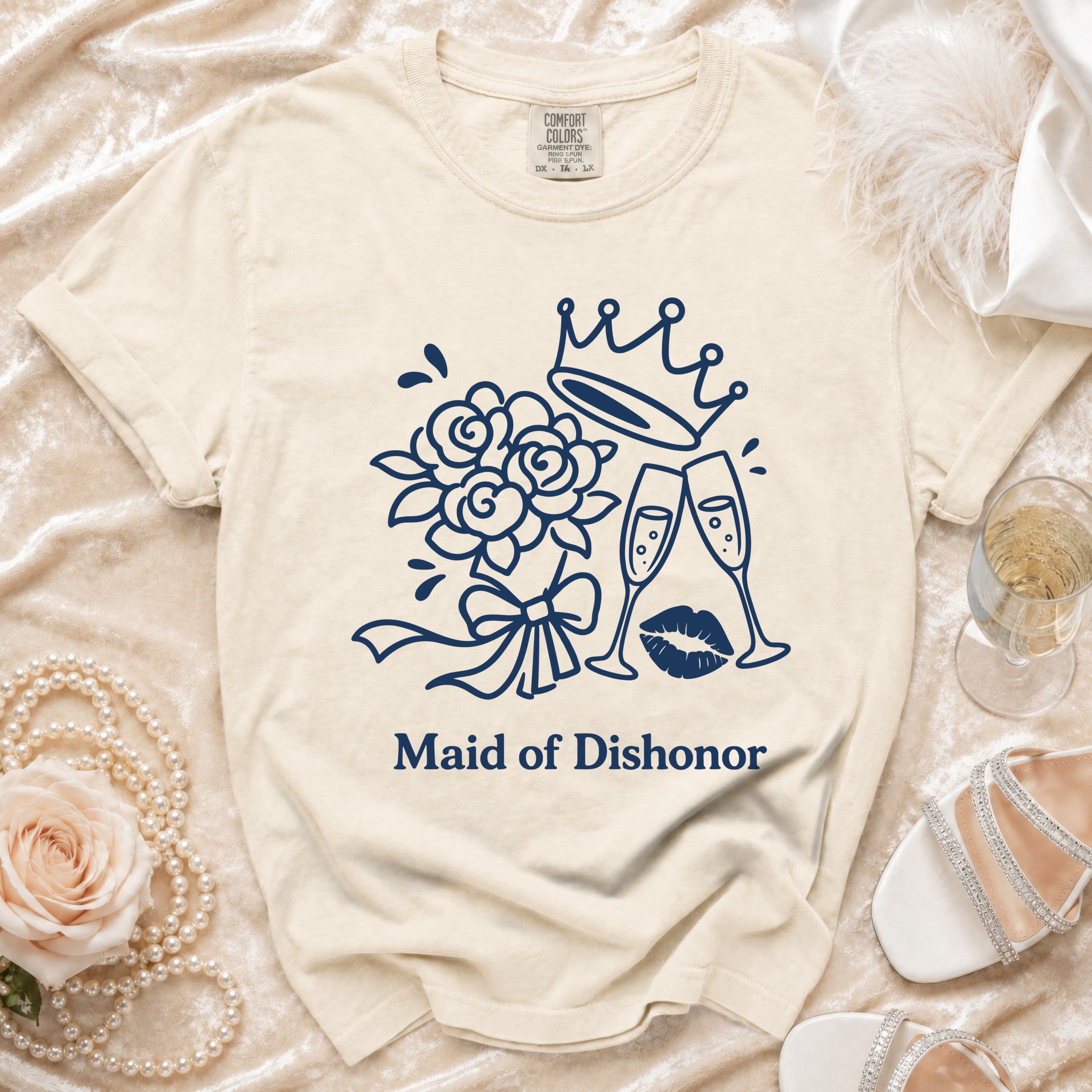 Cream t-shirt with navy blue graphic and "Maid of Dishonor" text.