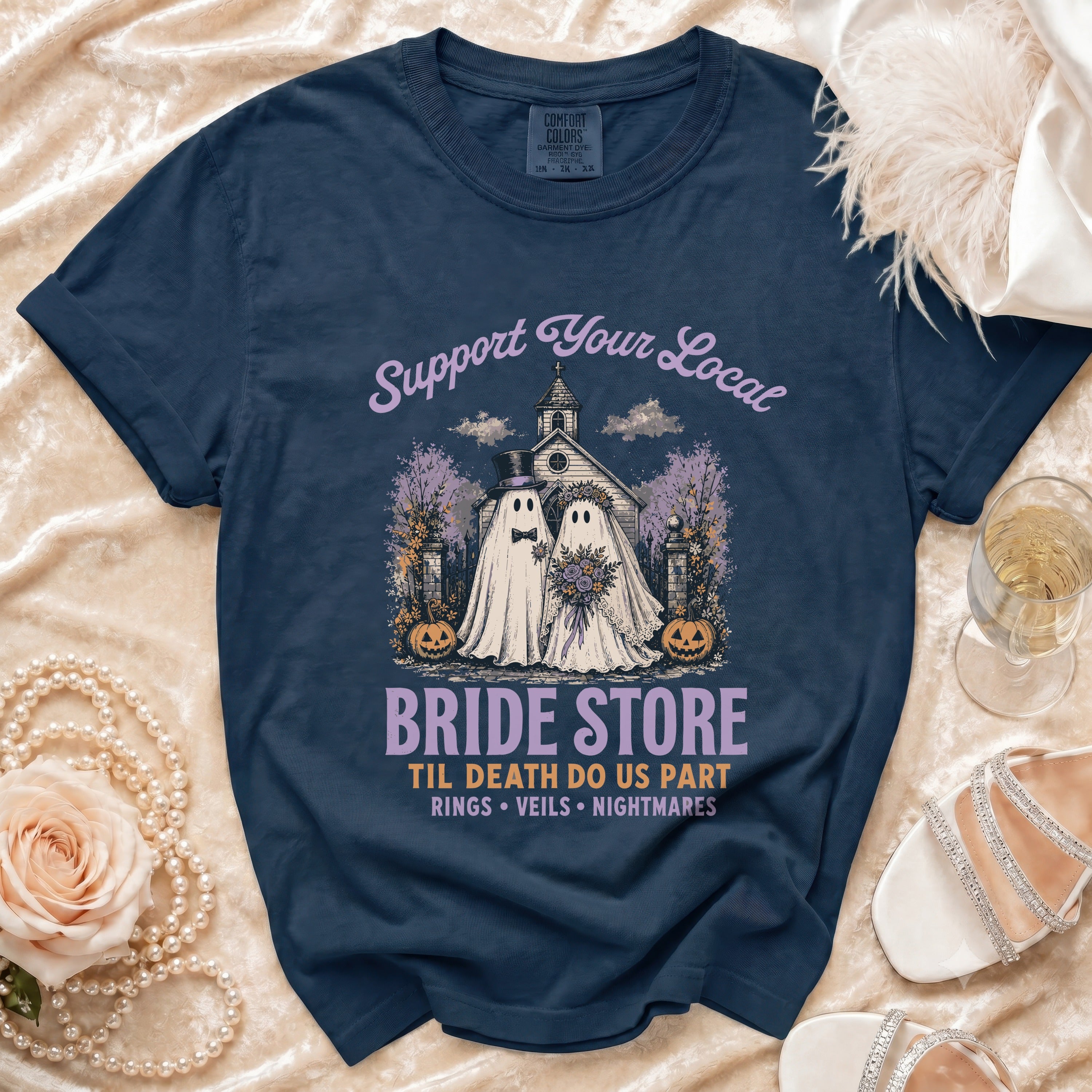 Navy t-shirt with "Support Your Local Bride Store" and ghost bride/groom graphic.