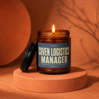Amber jar candle titled "Coven Logistics Manager" with "Spreadsheets, Spells, Seating Charts" and "VOWED".