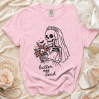 Pink t-shirt with skeleton bride graphic and text "better off dead".