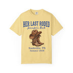 Yellow t-shirt with "Her Last Rodeo" and cowboy boots graphic.