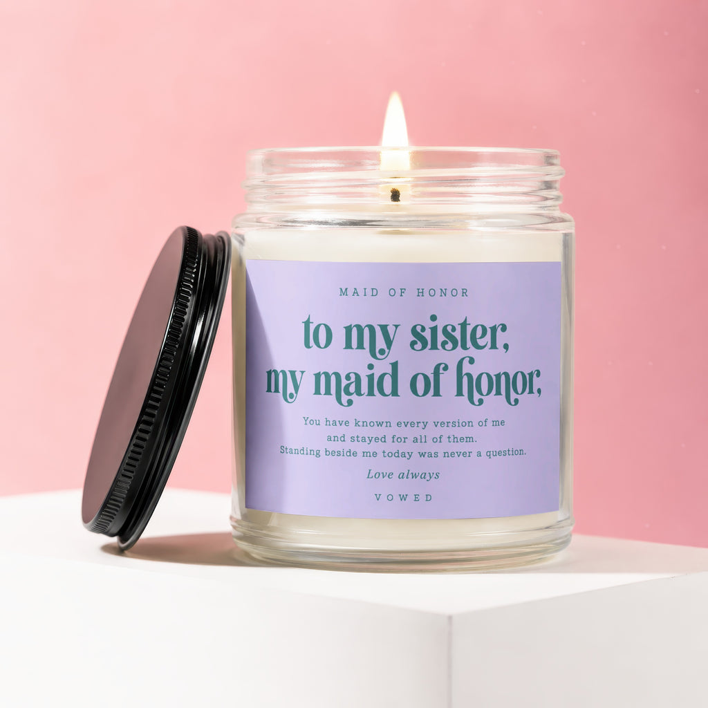 Candle labeled "to my sister, my maid of honor" with poem.