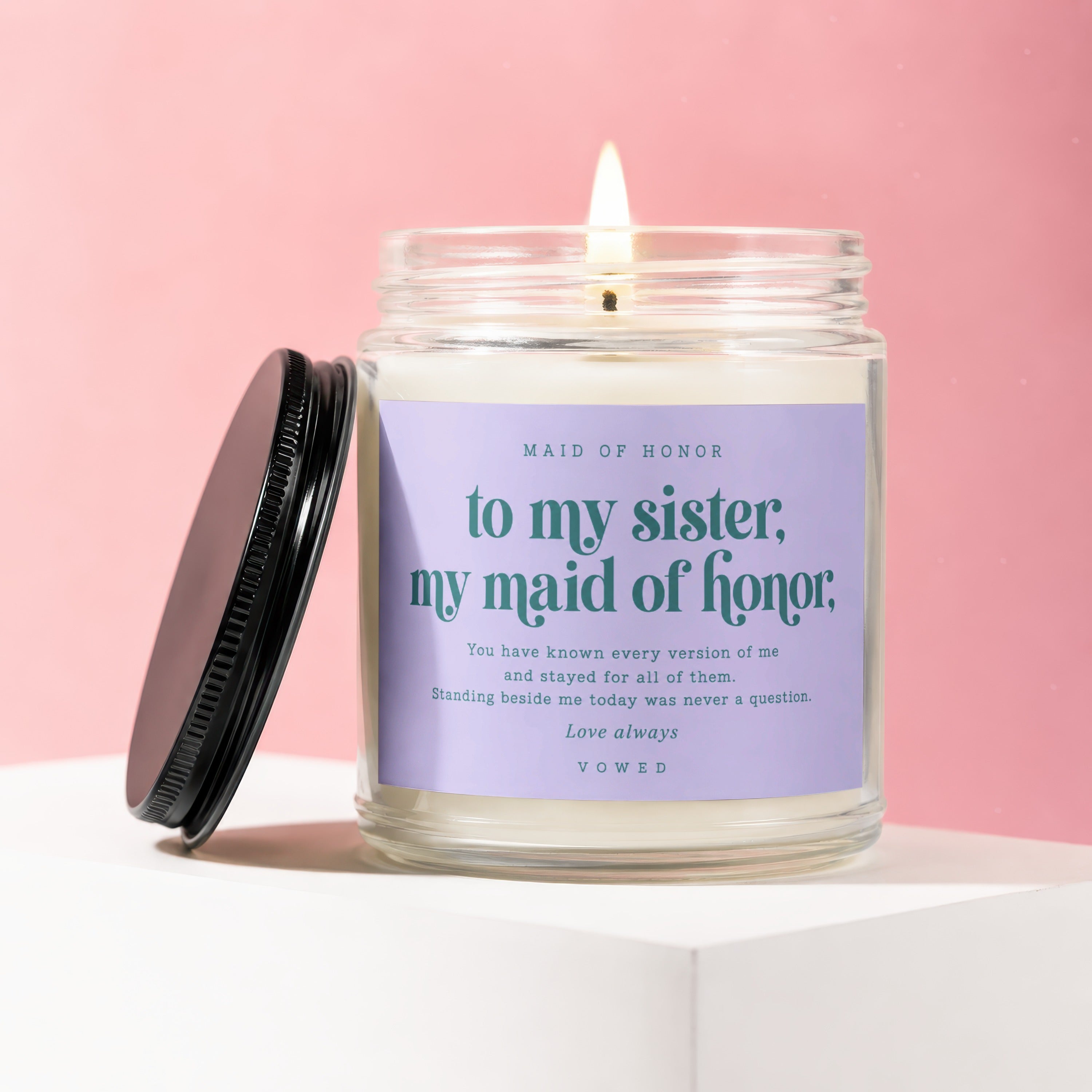 Candle labeled "to my sister, my maid of honor" with poem.