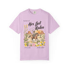 T-shirt graphic with "Her Last Rodeo" text, cowboy on horse, desert scene.