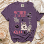 Purple t-shirt with "Mother of the Bride" text and spooky graphics.