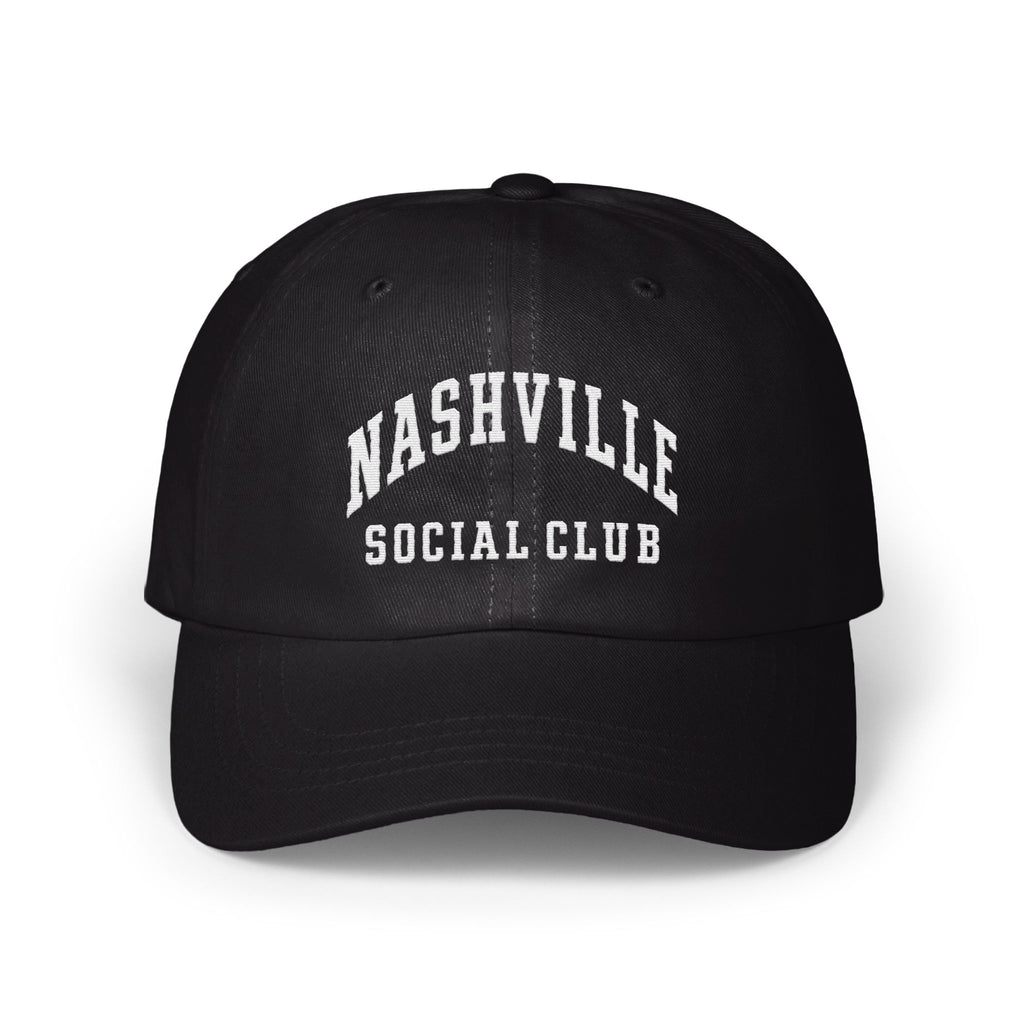 A black baseball cap featuring white embroidered text that reads NASHVILLE SOCIAL CLUB.