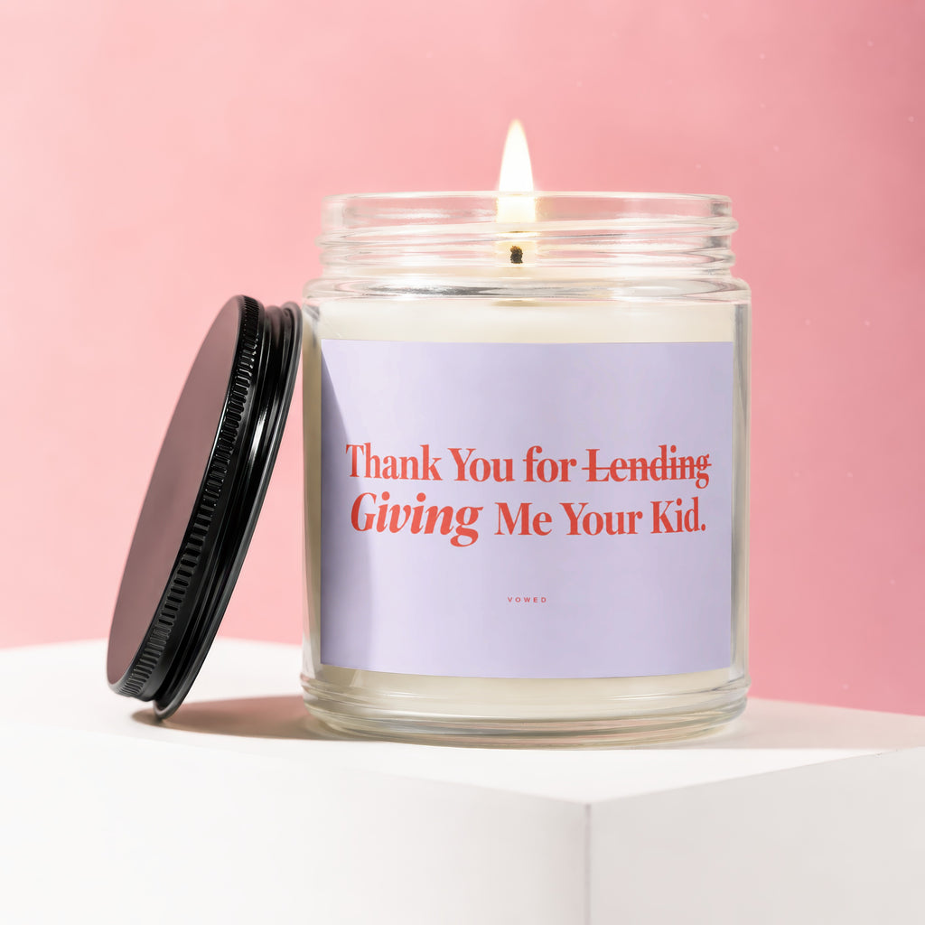 Scented candle with "Thank You for Lending Giving Me Your Kid" text.