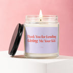 Scented candle with "Thank You for Lending Giving Me Your Kid" text.