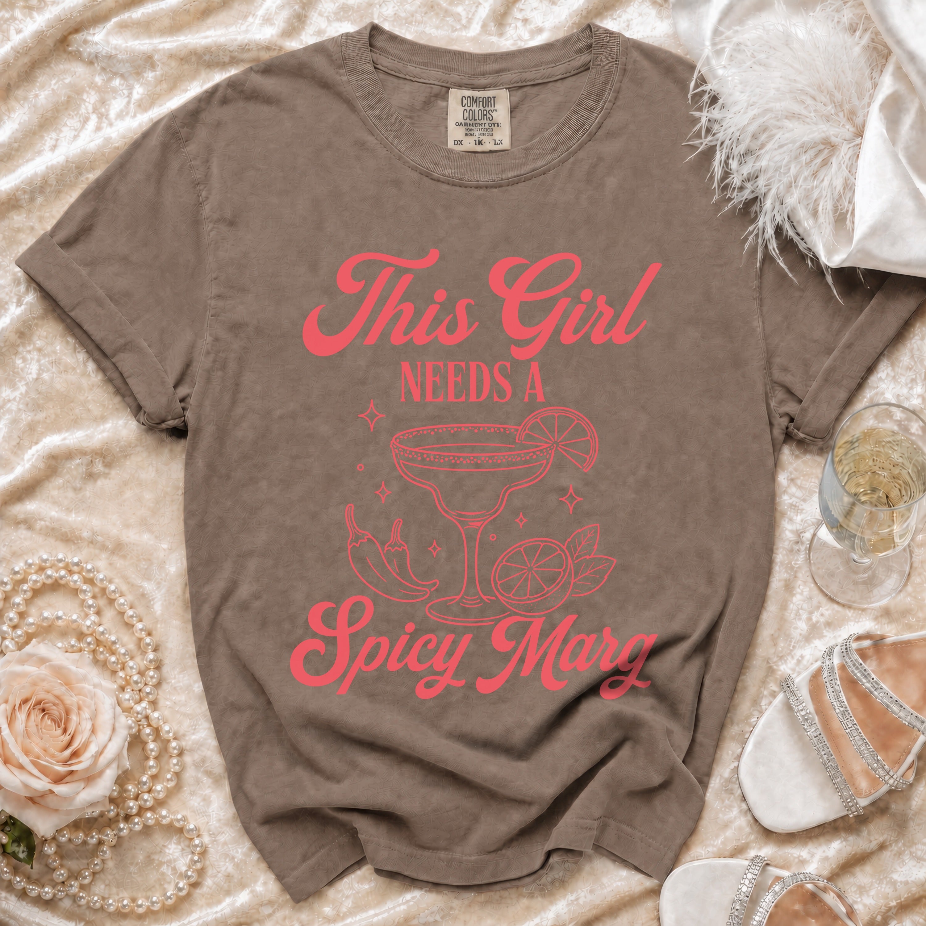 Brown Comfort Colors t-shirt with "This Girl Needs A Spicy Marg" graphic.