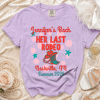Lavender t-shirt with "Jennifer's Bach HER LAST RODEO Nashville, TN Summer 2026" text.
