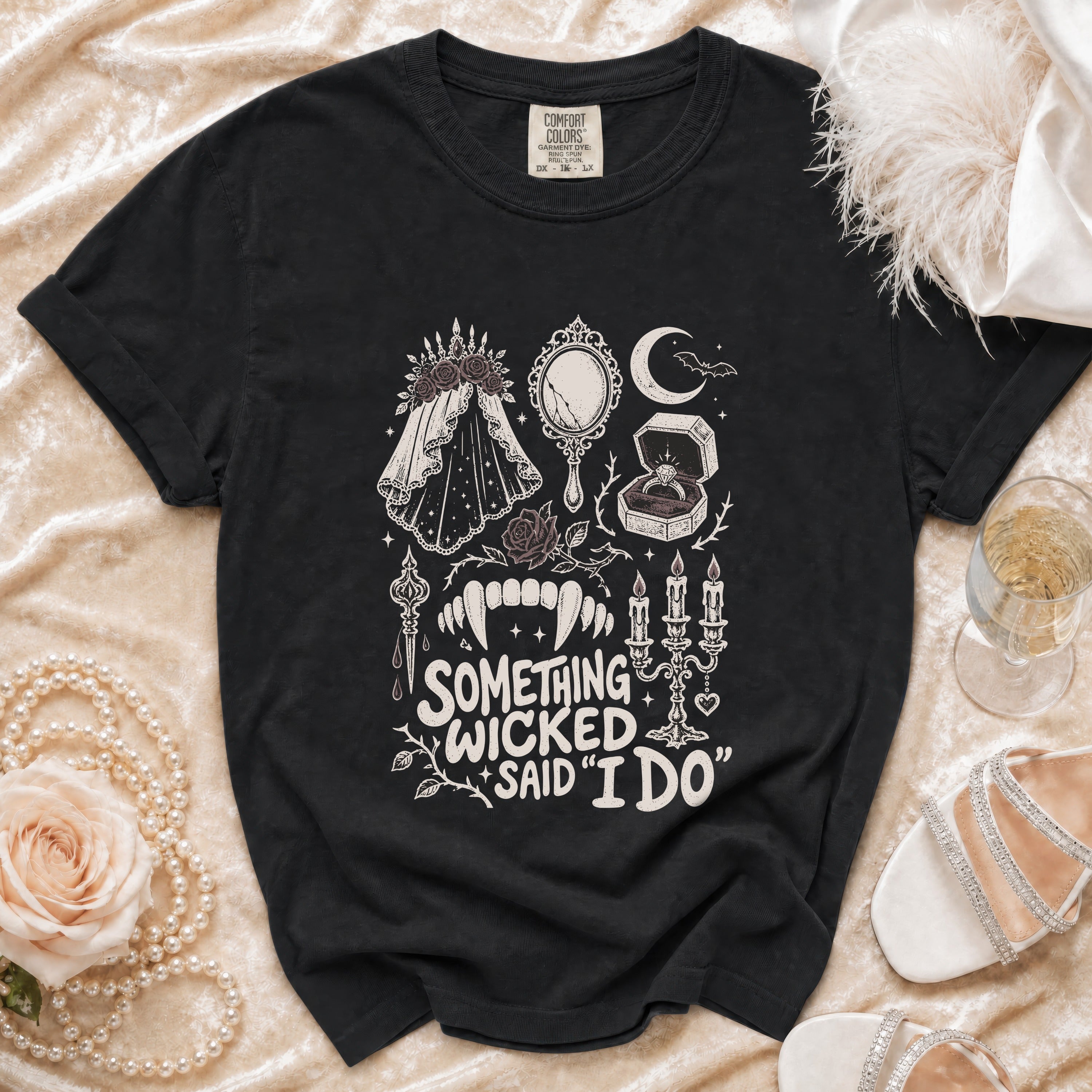 Black t-shirt with "Something Wicked Said I Do" gothic wedding graphic.