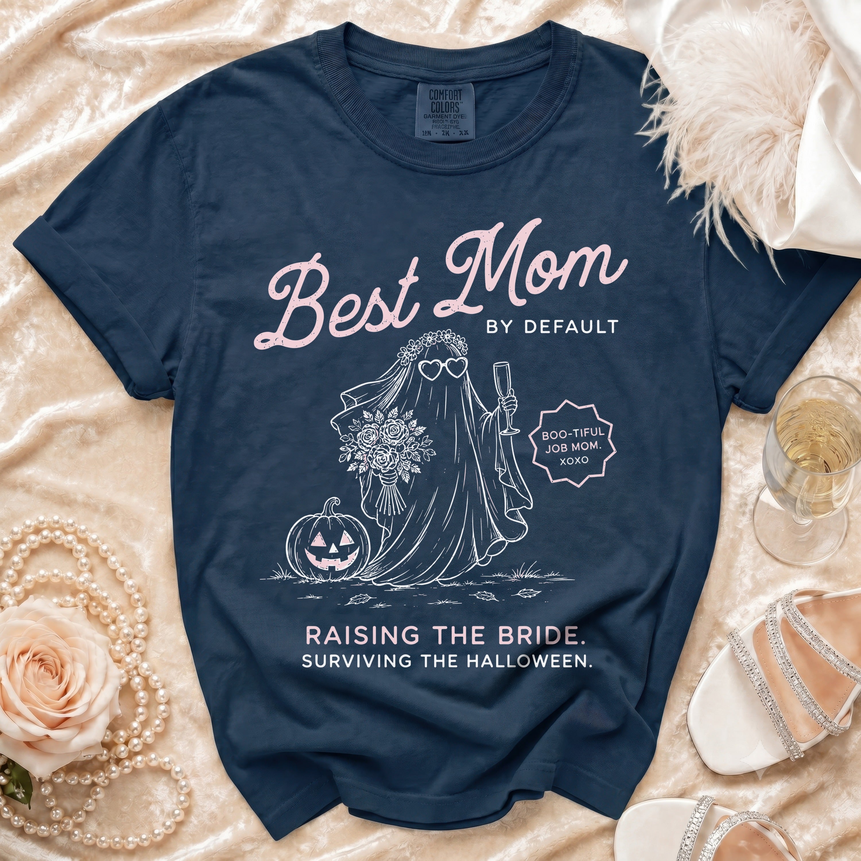 Navy t-shirt with "Best Mom By Default" text and ghost bride illustration.