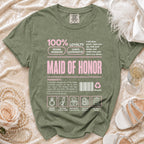 Green t-shirt with "Maid of Honor" text, ingredients, and icons.