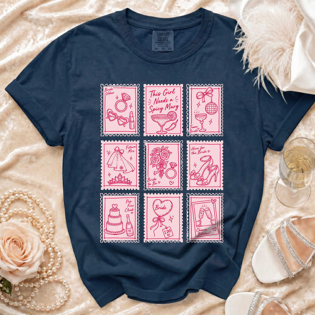 Navy t-shirt with pink stamp graphics of wedding and bachelorette party imagery.
