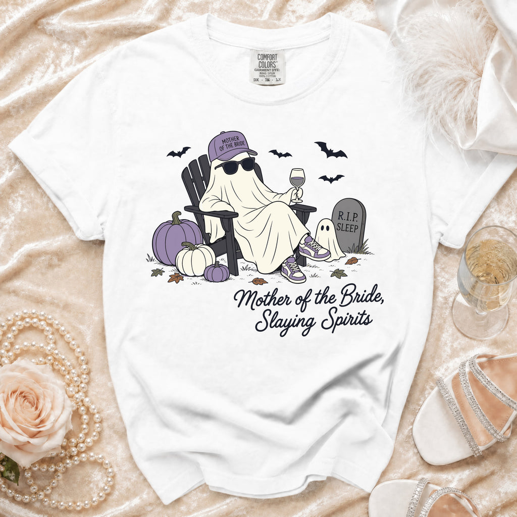 White t-shirt with a cartoon ghost wearing sunglasses and a "Mother of the Bride" hat, holding wine.