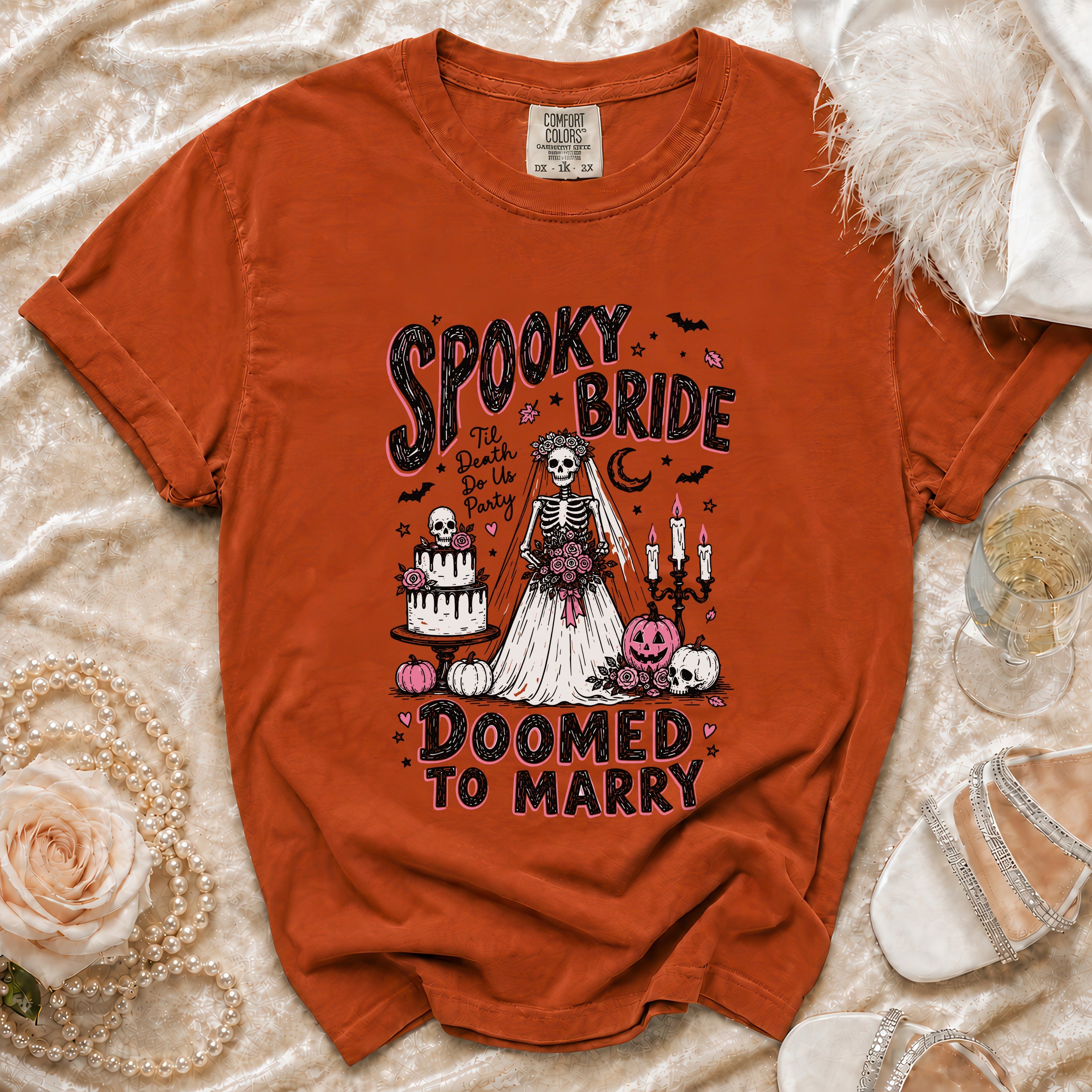 Orange t-shirt with "Spooky Bride 'Til Death Do Us Party Doomed to Marry" graphic.