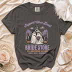Dark gray t-shirt with ghosts dressed as bride and groom, text "BRIDE STORE".