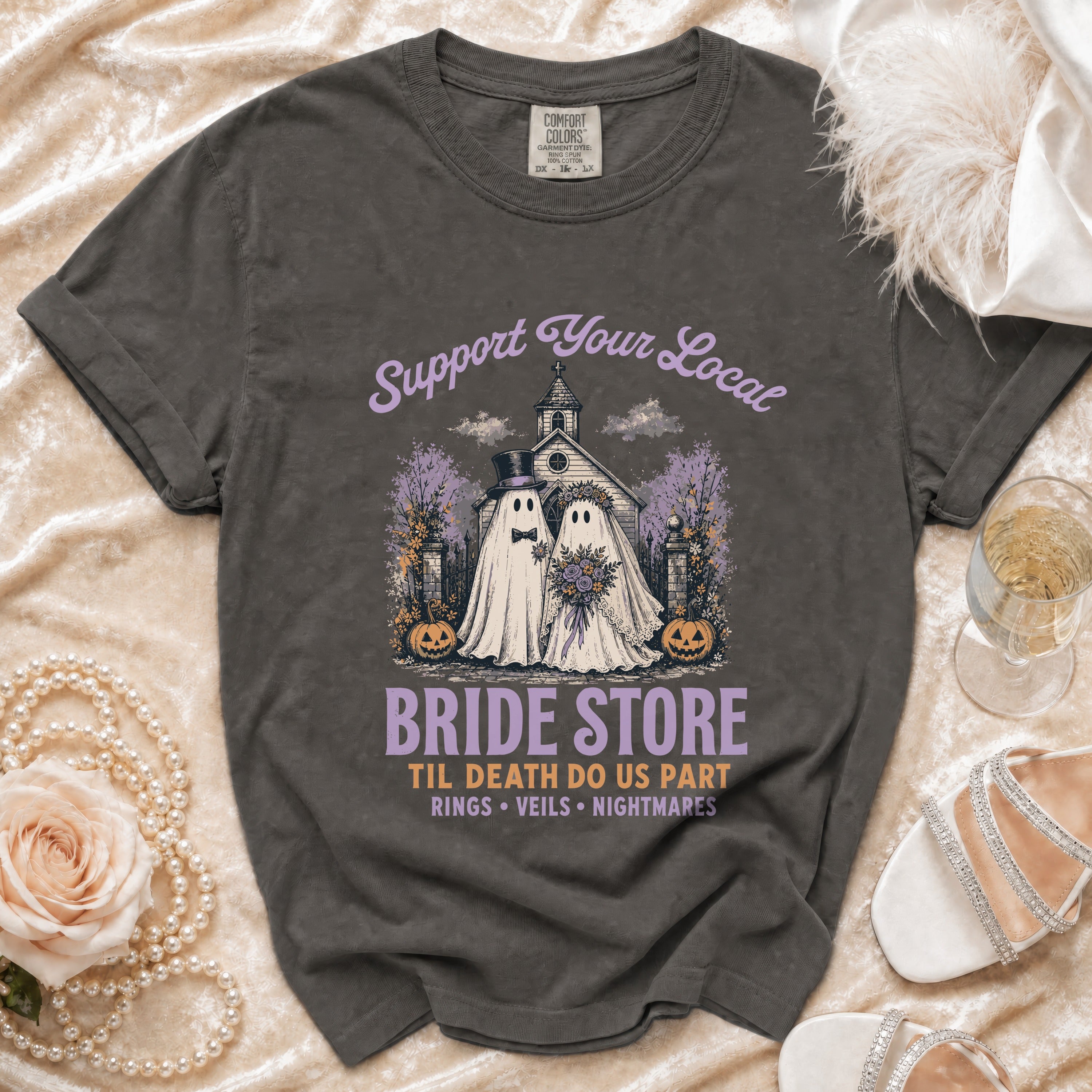 Dark gray t-shirt with ghosts dressed as bride and groom, text "BRIDE STORE".