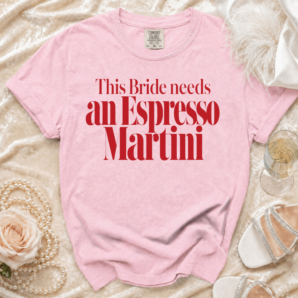 Pink t-shirt with "This Bride needs an Espresso Martini" text and champagne accessories.