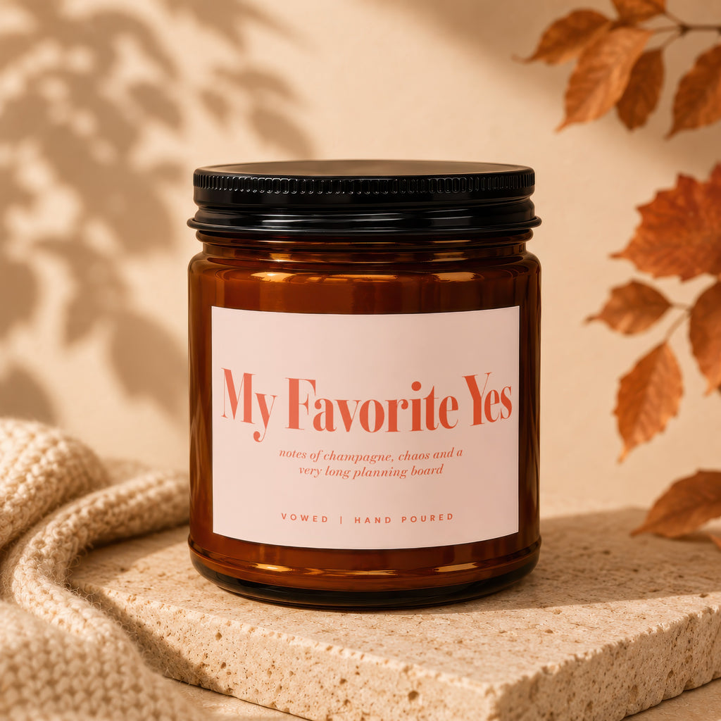 Brown glass candle labeled "My Favorite Yes" with scent notes.
