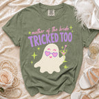 Olive green t-shirt with "mother of the bride TRICKED TOO" text and a ghost graphic.
