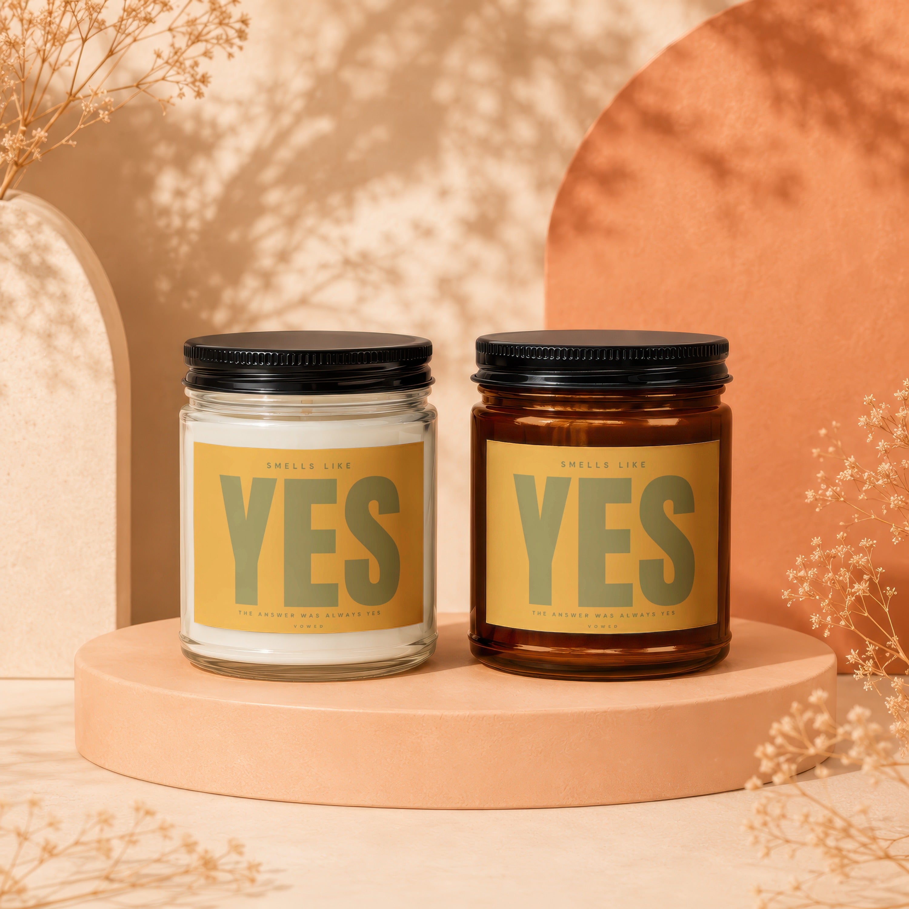 Two jars with black lids, featuring yellow labels with "YES" in green text.