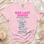 Pink t-shirt with "Her Last Rodeo Jennifer's Bach" and cowboy boots.