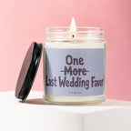 Scented candle with label "One More Last Wedding Favor" on pink background.
