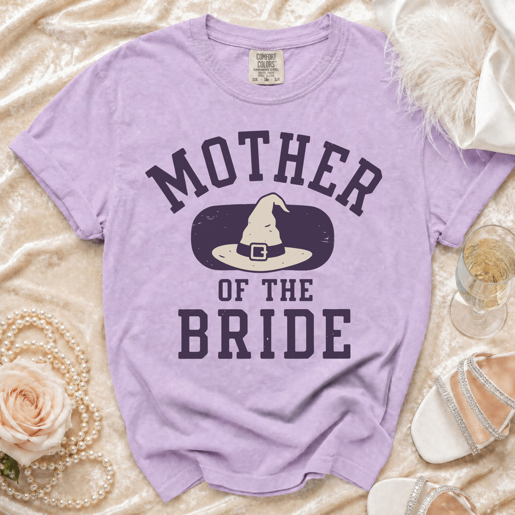 Purple t-shirt with "Mother of the Bride" and witch hat graphic.
