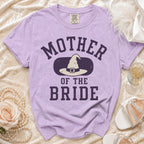 Purple t-shirt with "Mother of the Bride" and witch hat graphic.