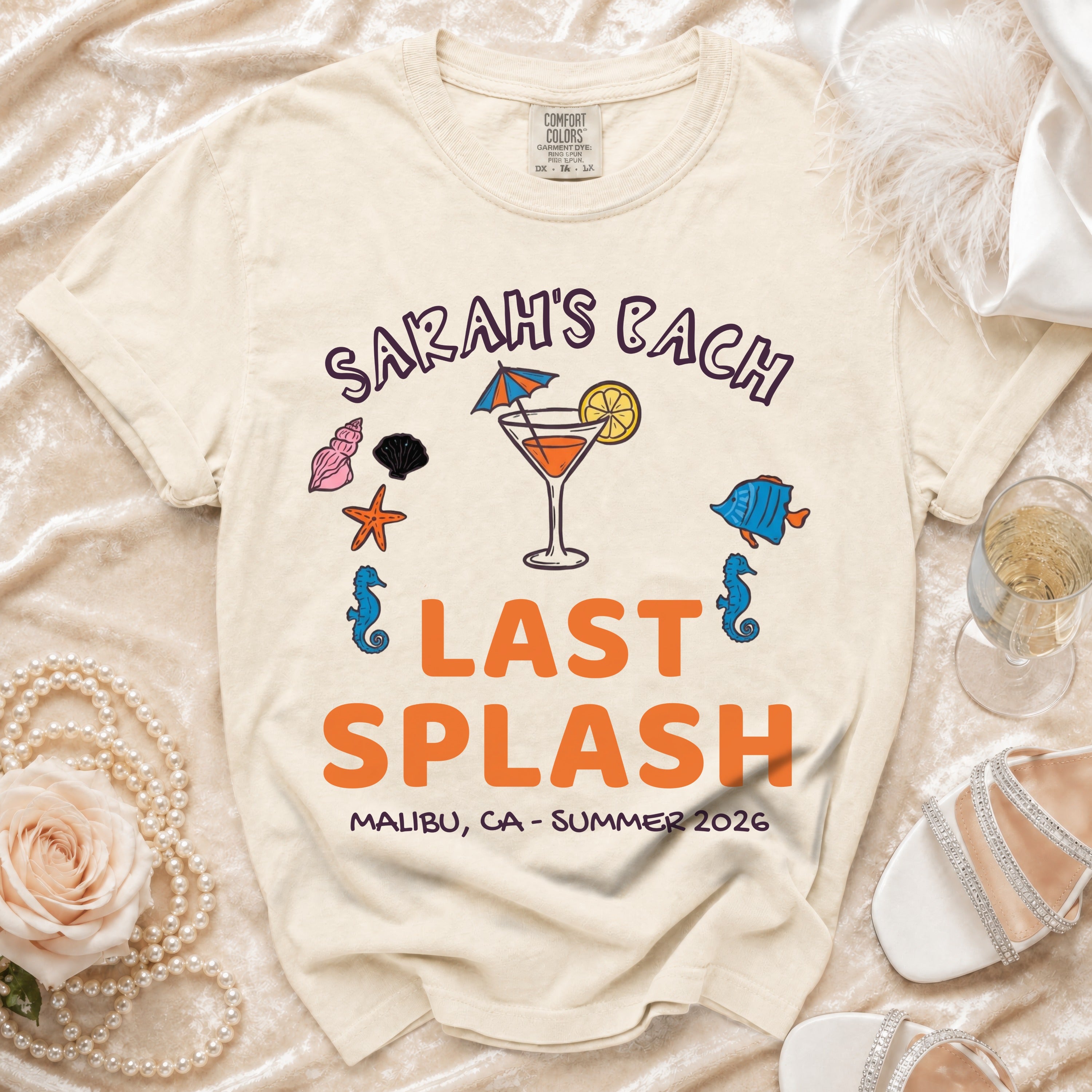 Cream t-shirt with "Sarah's Bach Last Splash Malibu, CA Summer 2026" text and graphics.