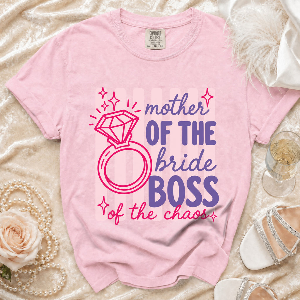 Pink t-shirt with "Mother of the Bride Boss of the Chaos" text and ring graphic.