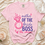 Pink t-shirt with "Mother of the Bride Boss of the Chaos" text and ring graphic.