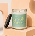Glass candle with lid removed, reads "To The Friend Who Officiated".
