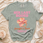 Pink text "HER LAST RODEO" and "Jennifer's Bach Nashville, TN Summer 2026" on a gray t-shirt.