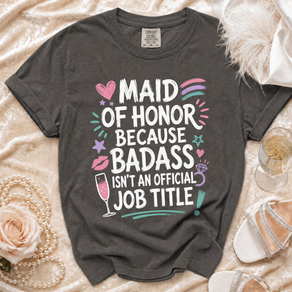 Dark grey t-shirt with "Maid of Honor Because Badass Isn't An Official Job Title" graphic.