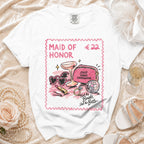 White t-shirt with "Maid of Honor" and bridal accessories graphic.