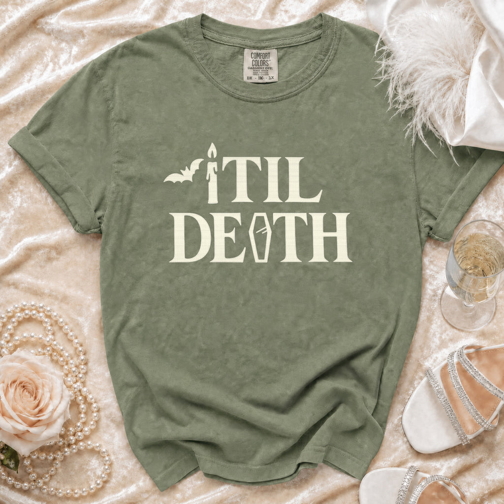 Green t-shirt with "TIL DEATH" text, bat, coffin, and candle graphic.