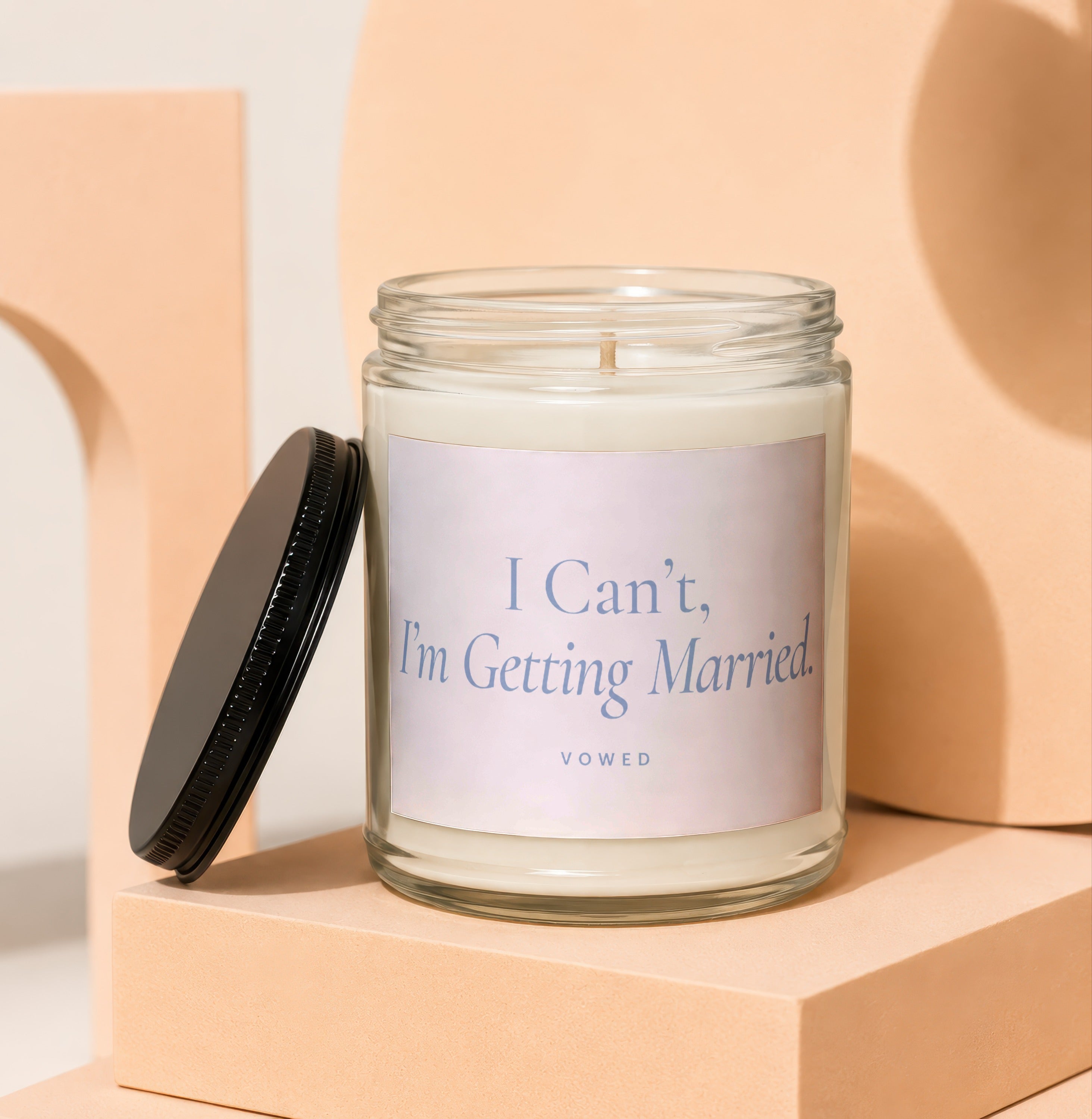 Candle with text "I Can't, I'm Getting Married." on label.