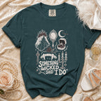 Teal t-shirt with "Something Wicked Said I Do" gothic wedding graphic.