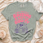 Light green t-shirt with pink "Mother of the Bride Raising a Little Boo-ty" graphic.