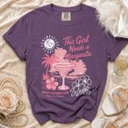 Purple t-shirt with "This Girl Needs a Margarita" text and beach graphic.