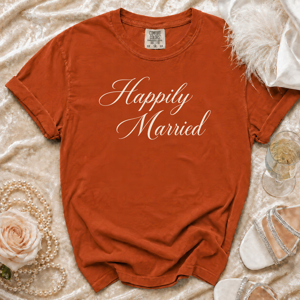 Orange t-shirt with "Happily Married" in white script, shown with pearls and heels.