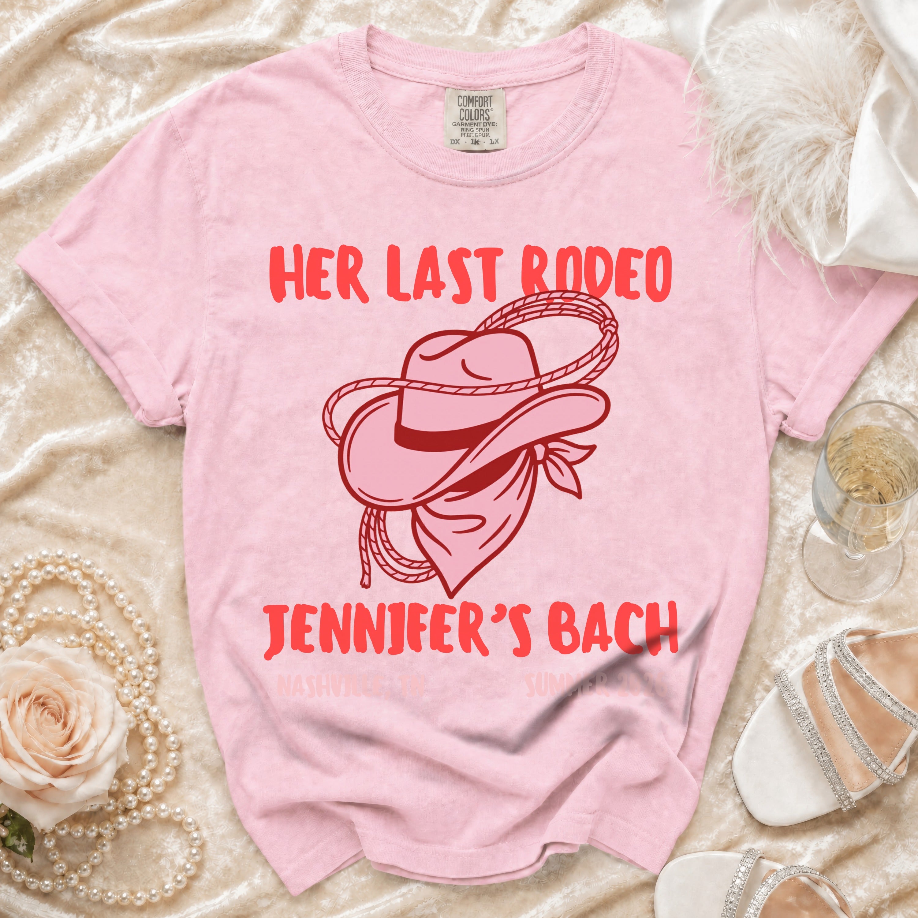 Pink t-shirt with "Her Last Rodeo" and "Jennifer's Bach" text, cowboy hat graphic.