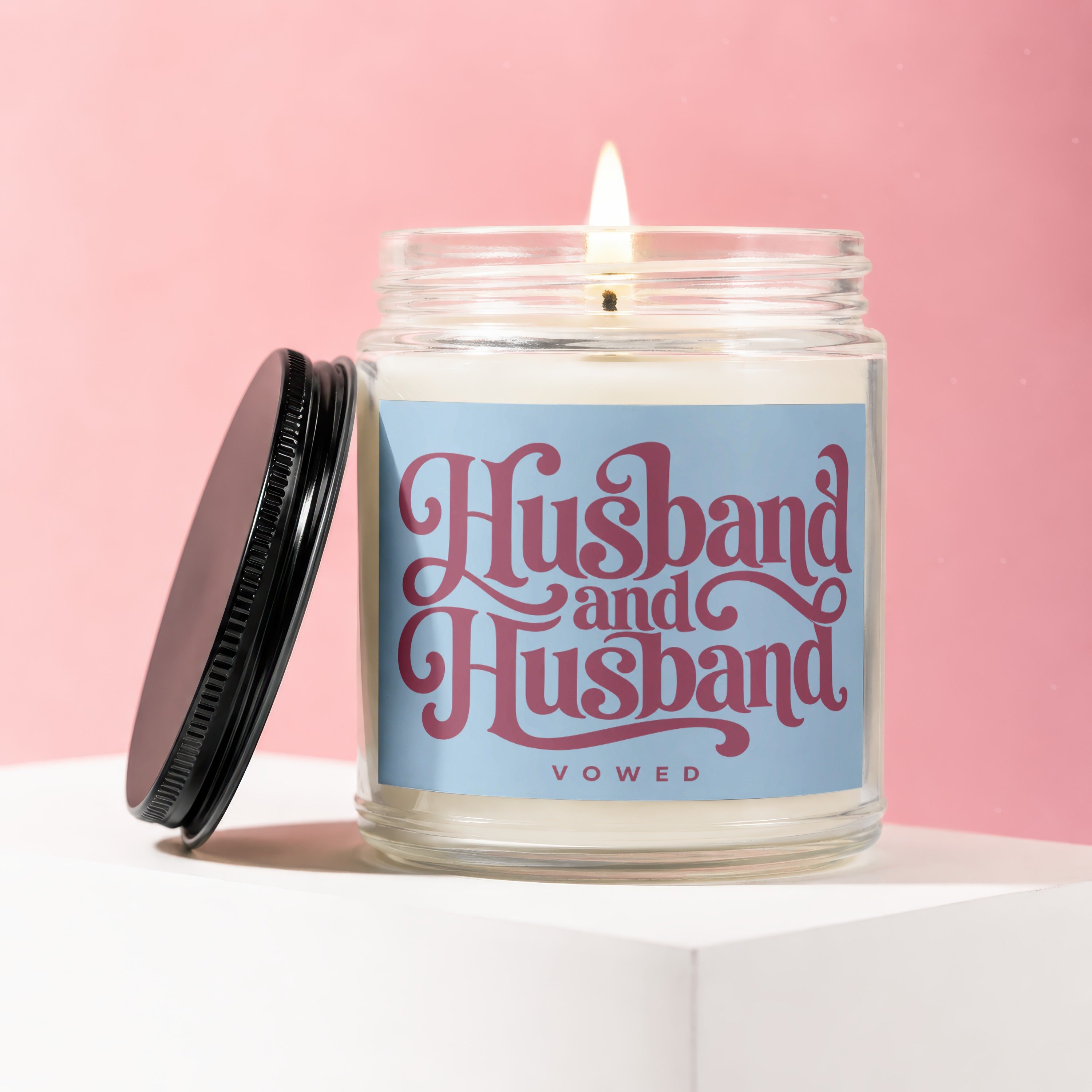 Glass candle with label reading "Husband and Husband Vowed".