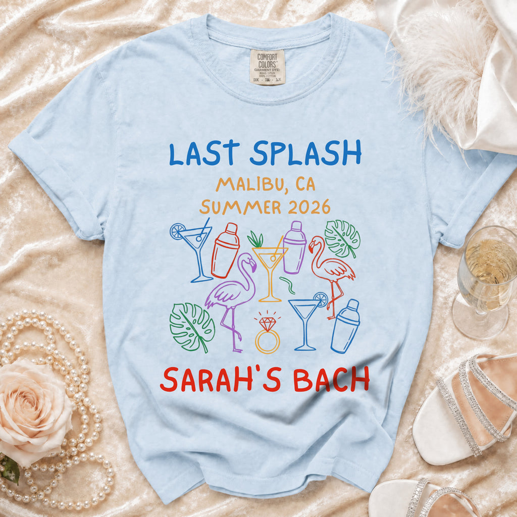 Light blue t-shirt with "Last Splash Malibu, CA Summer 2026 Sarah's Bach" text and graphics.